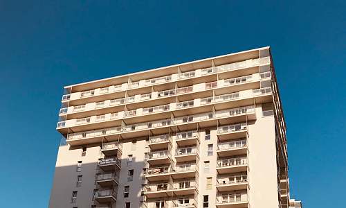 high rise high-rise building under blue sky town